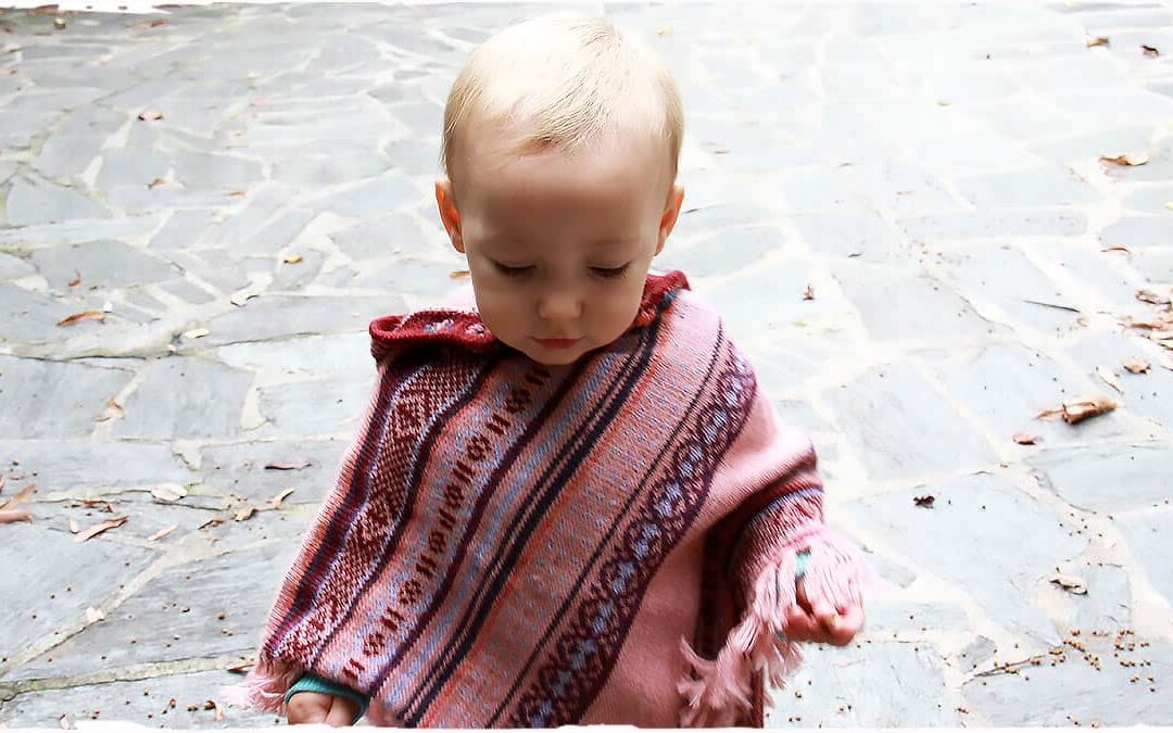 Poncho bambina per giocare in libertà
