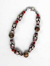 Pulseras Huayruro Ande.